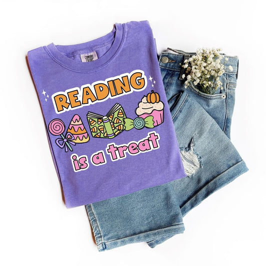 "Reading is a Treat" Halloween Teacher T-Shirt (Pink Text)