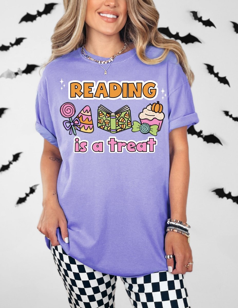 "Reading is a Treat" Halloween Teacher T-Shirt (Pink Text)